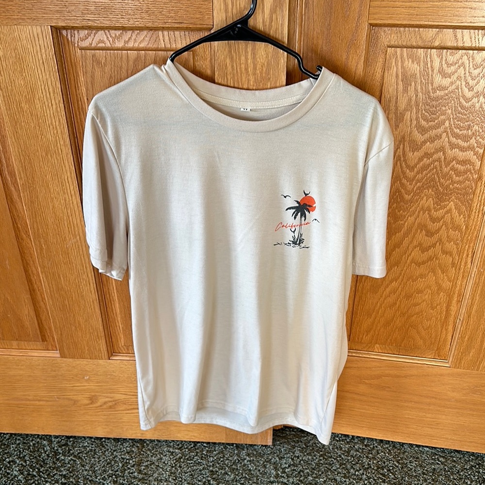 Beige Graphic T-Shirt with Palm Tree Design